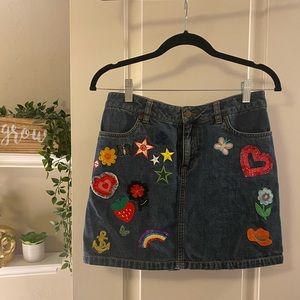 Denim skirt with patches